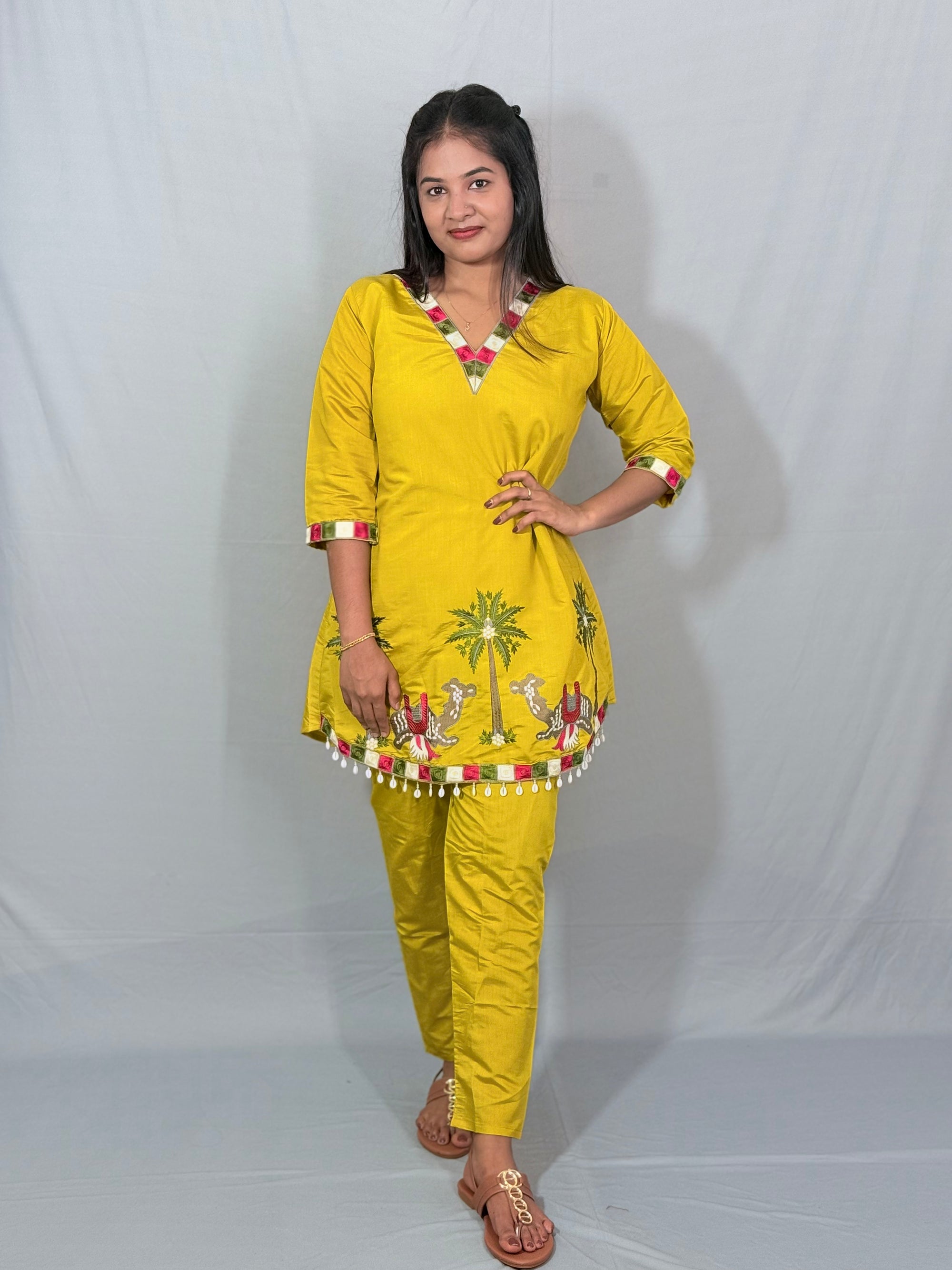 Yellow color kurti set with attractive thread work