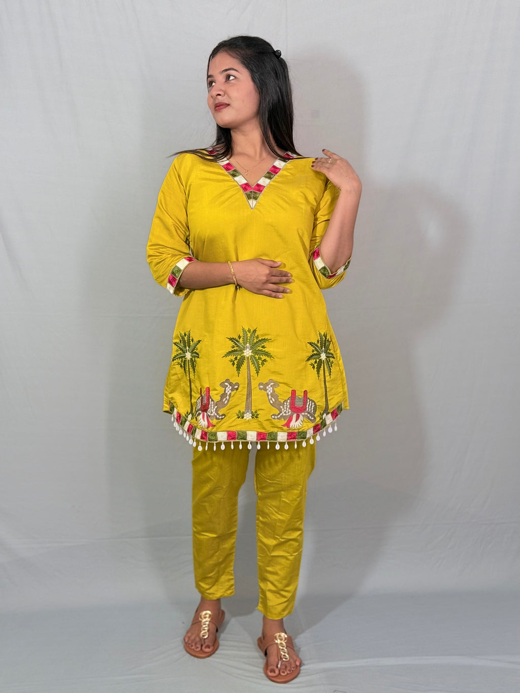 Yellow color kurti set with attractive thread work