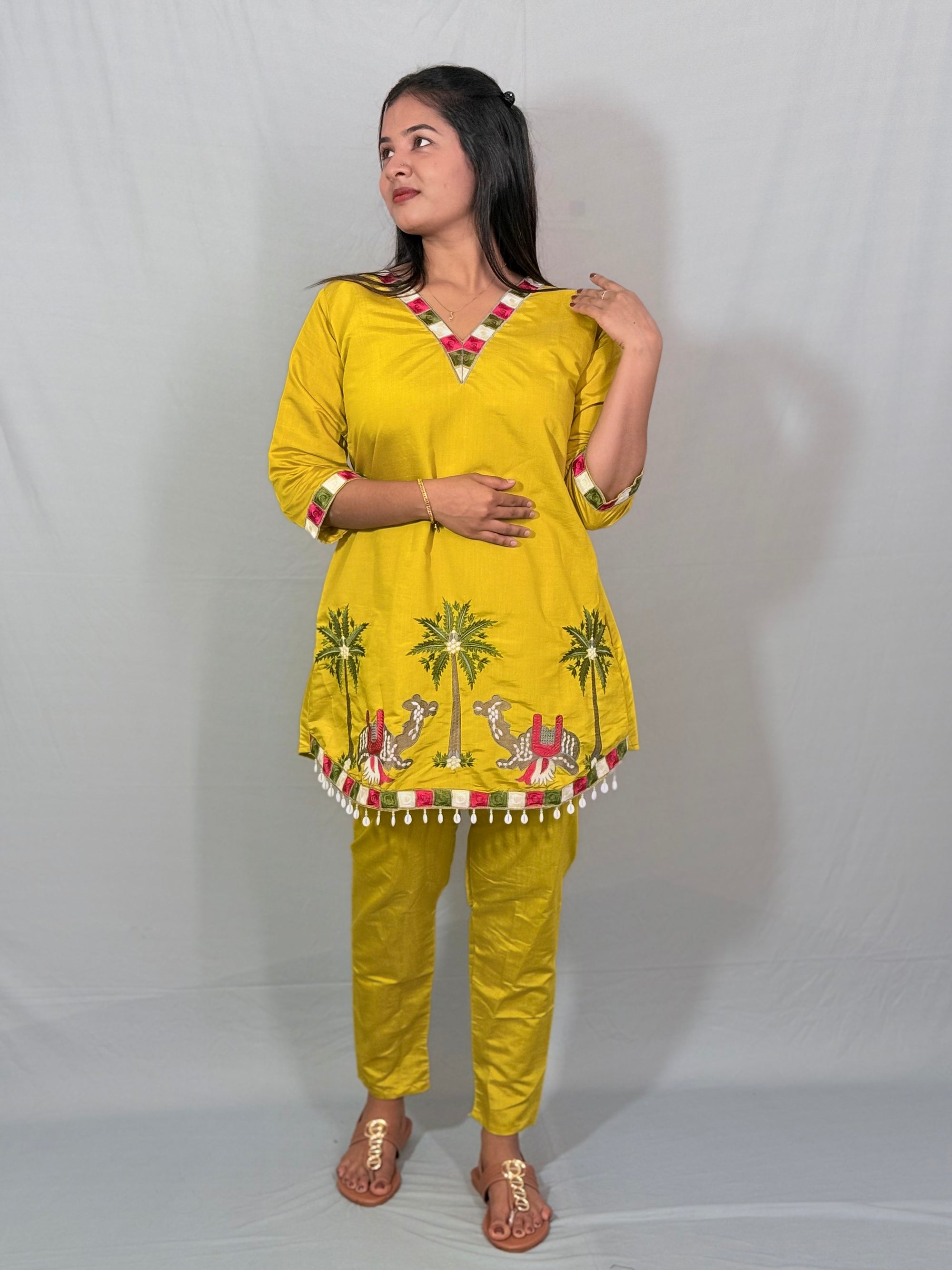 Yellow color kurti set with attractive thread work