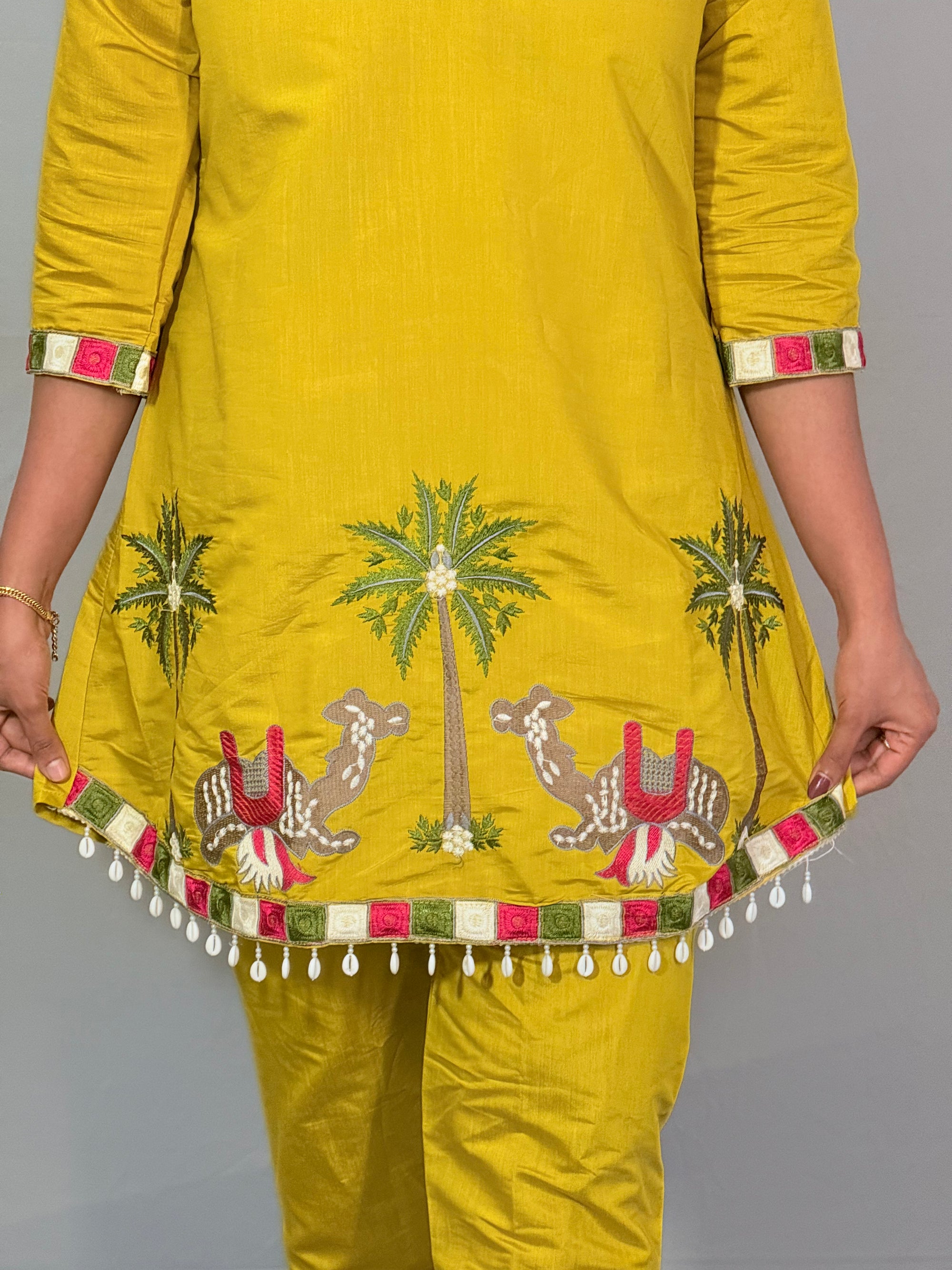 Yellow color kurti set with attractive thread work
